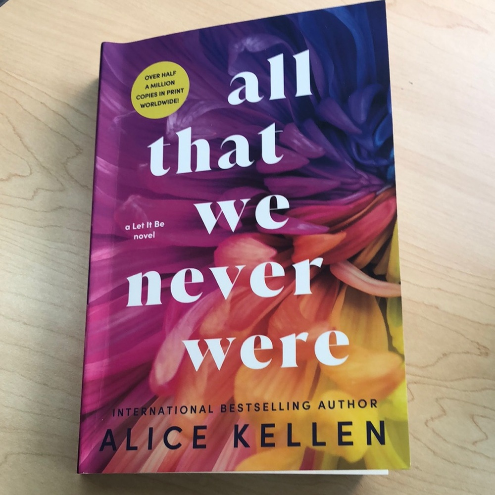 Colorful Book 'All That We Never Were' by Alice Kellen